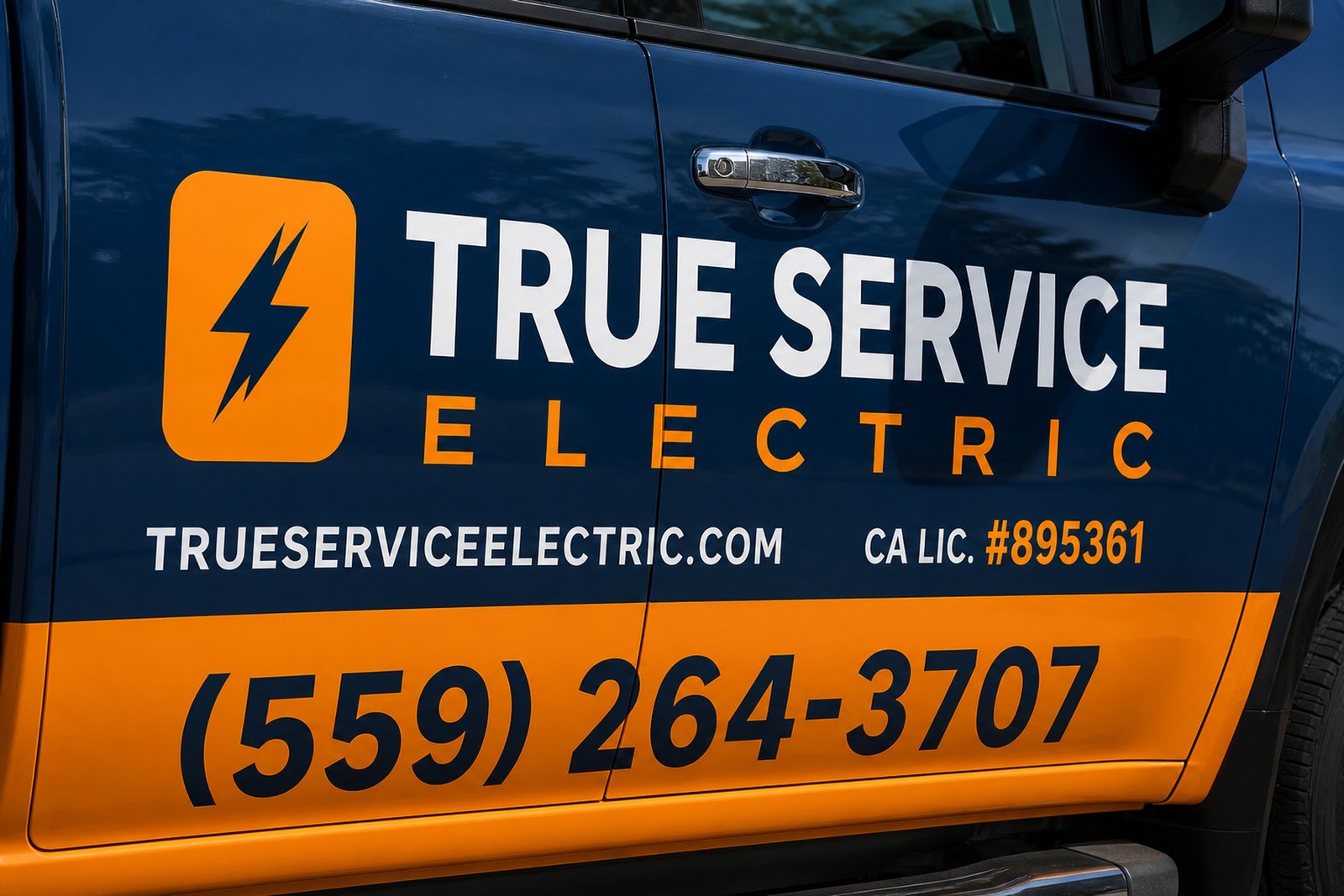 True Service Electric truck door wrap with lightning mark and phone number